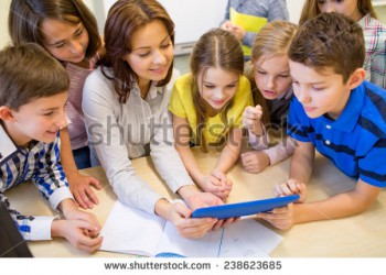 stock-photo-education-elementary-school-learning-technology-and-people-concept-group-of-school-kids-with-238623685